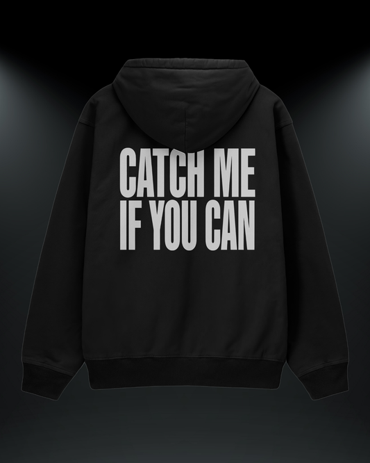 Catch Me If You Can reflektörlü oversize motorcu hoodie, siyah, arkadan görünüm. Reflektörlü CATCH ME IF YOU CAN yazısı, gece görünürlük